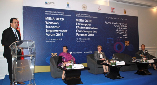 woman using phone in city